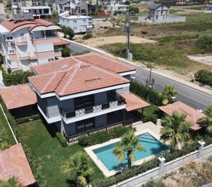 Deluxe Villa With Private Facilities For Sale In Belek - A private villa with a pool, garden and parking