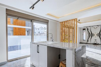 Smart Home Villa For Sale In Belek With A Private Garden & Pool - Kitchen and lounge