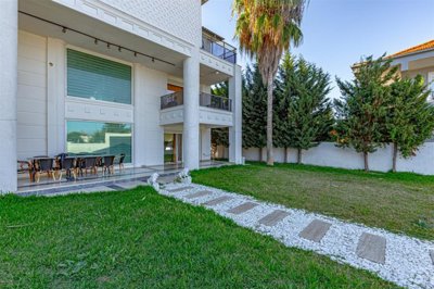 Striking Villa With Private Spa Facilities For Sale in Belek - Manicured garden and terrace