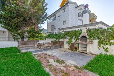 Striking Villa With Private Spa Facilities For Sale in Belek - BBQ and seating area