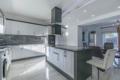 Striking Villa With Private Spa Facilities For Sale in Belek - Stylish kitchen with an island