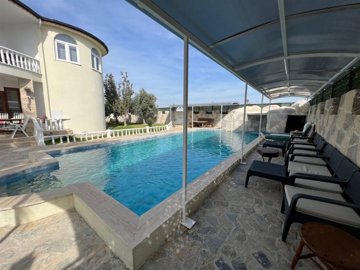 Substantial Antalya Villa For Sale In Kadriye - Private pool and shaded seating areas