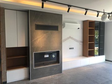 Spotless Villa For Sale in Belek, Antalya With A Private Pool & Spa Facilities - Modern fireplace