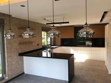 Spotless Villa For Sale in Belek, Antalya With A Private Pool & Spa Facilities - Stylish lighting and ample cabinetry storage
