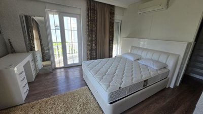 Upscale Villa For Sale In Belek With A Private Garden, Pool & Parking - Double bedroom with a balcony