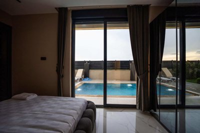 Smart Home Villa For Sale Near Golf Courses & The Airport In Belek - First bedroom with exterior access