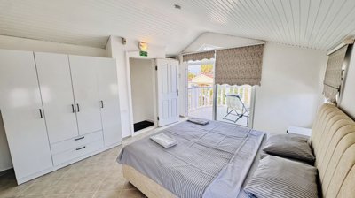 Glamourous Villa With A Private Pool For Sale In Antalya - Bedroom with a large balcony