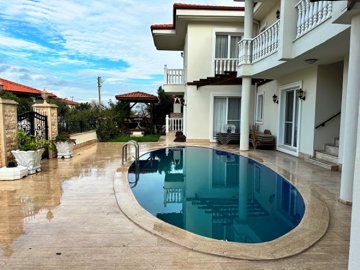Garden-Floor Apartment For Sale In Scenic Dalyan - A beautiful complex with a social exterior