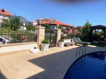 Garden-Floor Apartment For Sale In Scenic Dalyan - Large sun terraces and gated entry