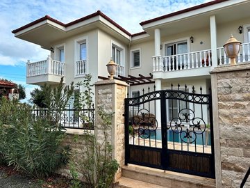 Garden-Floor Apartment For Sale In Scenic Dalyan - Gated entrance into the complex