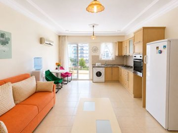 Attractive Didim Apartment For Sale – Living space with a balcony