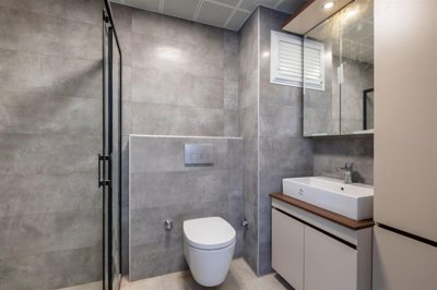Spacious One-Bedroom Apartment For Sale In Antalya - Modern sanitaryware & storage