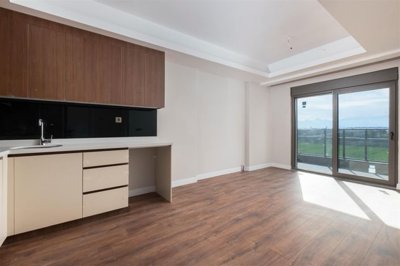 Spacious One-Bedroom Apartment For Sale In Antalya - A bright and airy living room