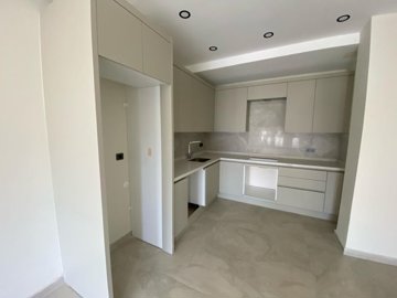 Newly-Completed Apartment For Sale - Stylish, simplistic kitchen