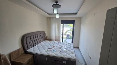 Belek Apartment With A Private Garden For Sale - Large double bedroom with terrace access