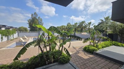 Belek Apartment With A Private Garden For Sale - Social sunbathing terraces and pool