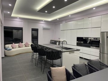 Belek Single-Storey Villa With A Private Pool For Sale In Antalya - Chic open-plan lounge and kitchen