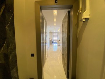 Blissful 2 & 3-Bed Apartments In Kusadasi For Sale With Luxury Facilities - Apartment entrance