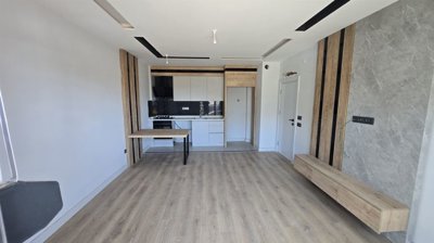 Brand-New Antalya Apartments In Altintas For Sale - Open-plan lounge and kitchen