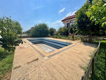 A Beautiful Detached Fethiye Property For Sale - Communal pool and terraces