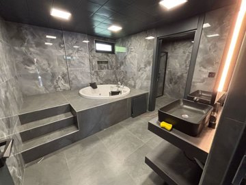 Opulent Antalya Property For Sale - Master bedroom ensuite with a jacuzzi
