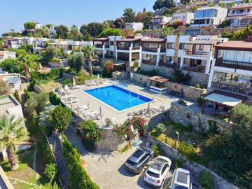 Key-Ready Sea View Bodrum Apartment For Sale In Gumusluk - Part of a beautiful complex