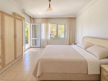 Seafront Semi-Detached Villa For Sale In Didim – Double bedroom with a balcony