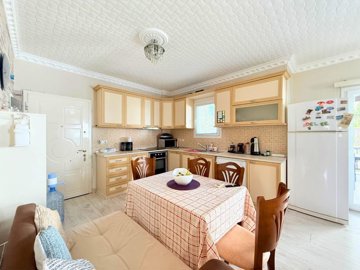 Nature View Apartment For Sale In Bodrum - Dining area and kitchen