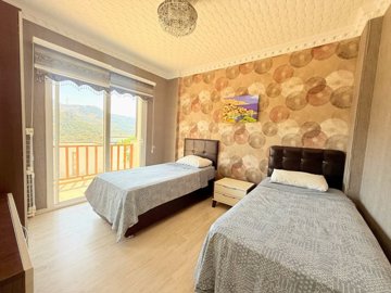 Nature View Apartment For Sale In Bodrum - Second bedroom with a balcony