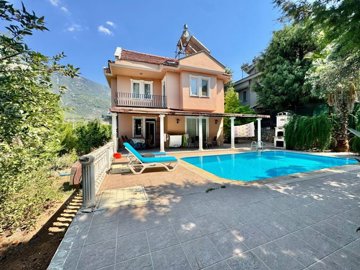 Charming Detached Fethiye Property For Sale - Main view of the beautiful villa and garden