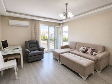 Furnished Apartment For Sale In Didim – Lounge with a balcony
