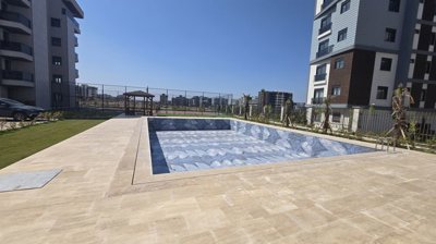 1 & 2 Bedroom Antalya Homes In Altintas For Sale - Huge social sunbathing terrace