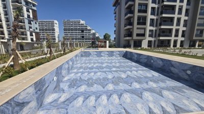 1 & 2 Bedroom Antalya Homes In Altintas For Sale - Large communal swimming pool