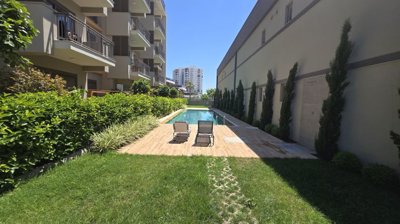 Garden Apartment For Sale In Antalya - Shared pool and terraces