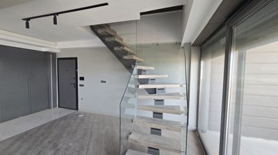 City View Apartment For Sale In Antalya - Stylish staircase in the lounge