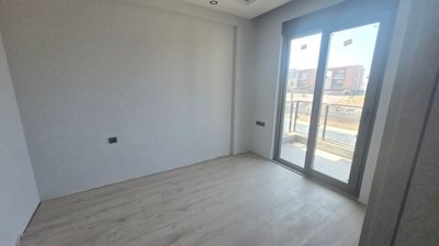 1 & 2 Bed Apartments In Altintas, Antalya For Sale - Bedroom with a balcony