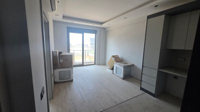 1 & 2 Bed Apartments In Altintas, Antalya For Sale - Open-plan kitchen and lounge