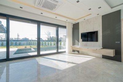 Beautiful Detached Triplex Villa For Sale in Belek, Antalya - Lounge with pool and terrace access