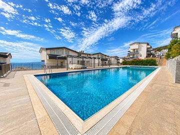 Sea View Penthouse For Sale In Didim - Two communal pools on-site