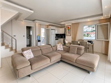 Sea View Penthouse For Sale In Didim - Open-plan living room and kitchen