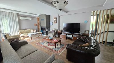 Exquisite Marmaris Villa For Sale - Lounge with a fireplace