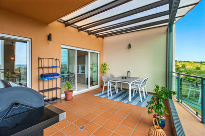 Balcony dining table and BBQ.jpg