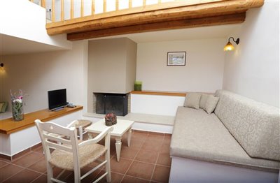 villas-interior-living-room-fireplace-and-tv