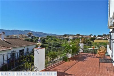 Upstairs terrace with orchard views