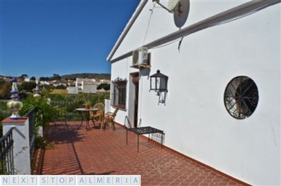 Upstairs terrace with orchard views