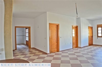 Large living/dining room & doors to kitchen
