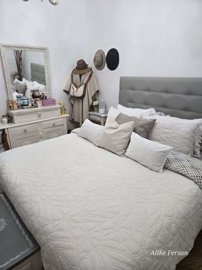 1306541075924032615430016