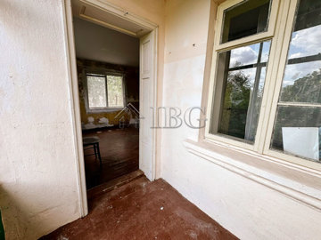partly-renovated-river-house-big-outbuilding-