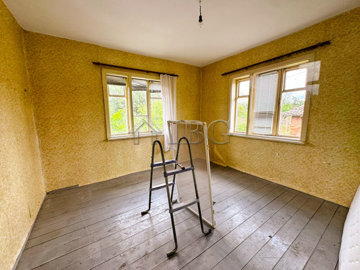 partly-renovated-river-house-big-outbuilding-