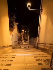 Exiting-the-garden-door-to-Via-Garibaldi-and-facing-down-the-stairs-at-night